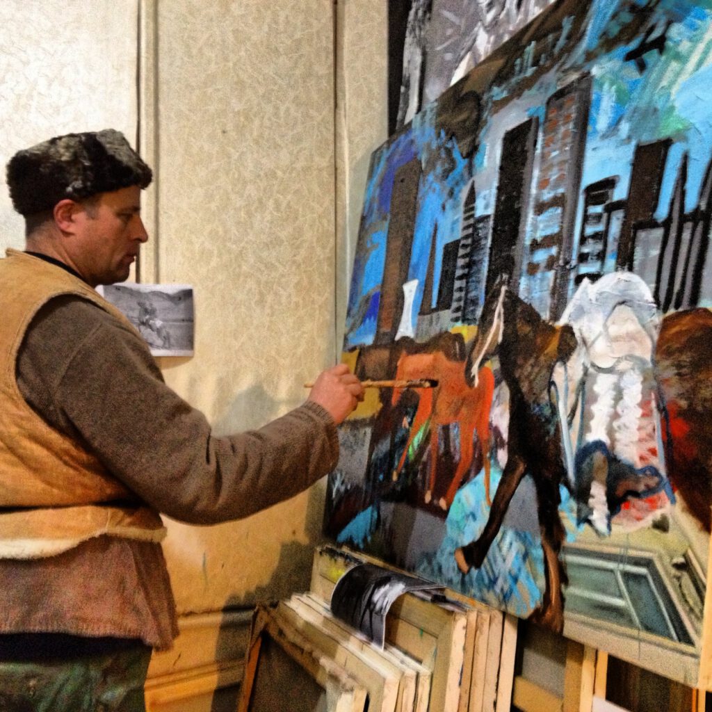 Hans painting on "New York Packhorses"
