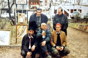 Otar Chkhartishvili and friends showing paintings at the Dry Bridge art market in Tbilisi in 1998.