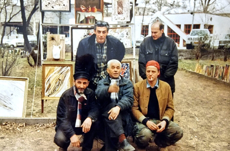 Otar Chkhartishvili and friends showing paintings at the Dry Bridge art market in Tbilisi in 1998.