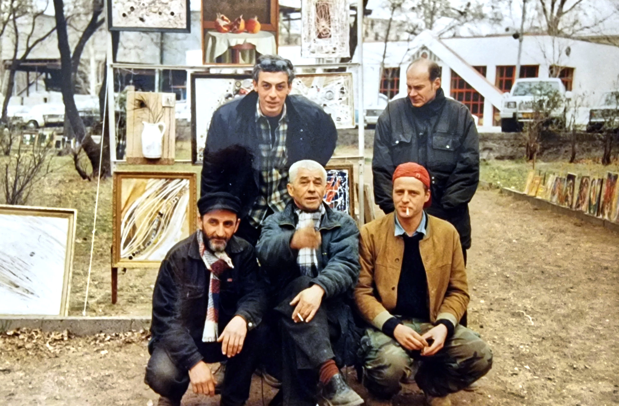 Otar Chkhartishvili and friends showing paintings at the Dry Bridge art market in Tbilisi in 1998.
