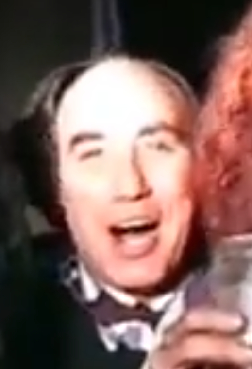Meir Mendelssohn holding a glass, screenshot from a video